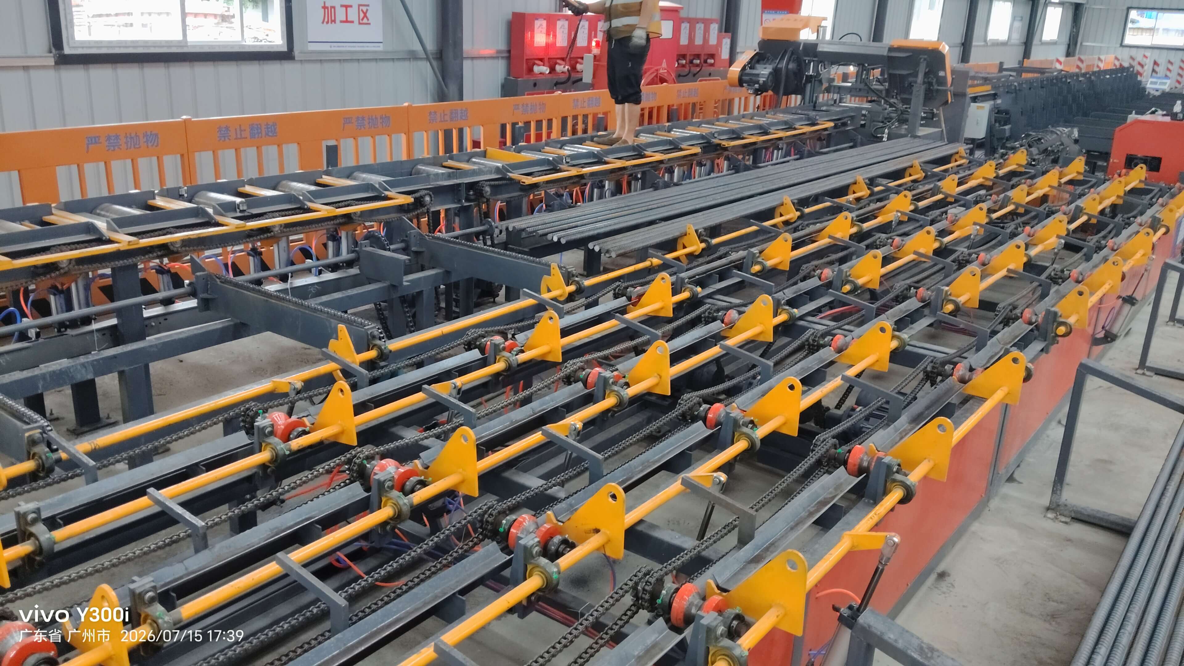 Fully automatic steel bar sawing threading and grinding production line
