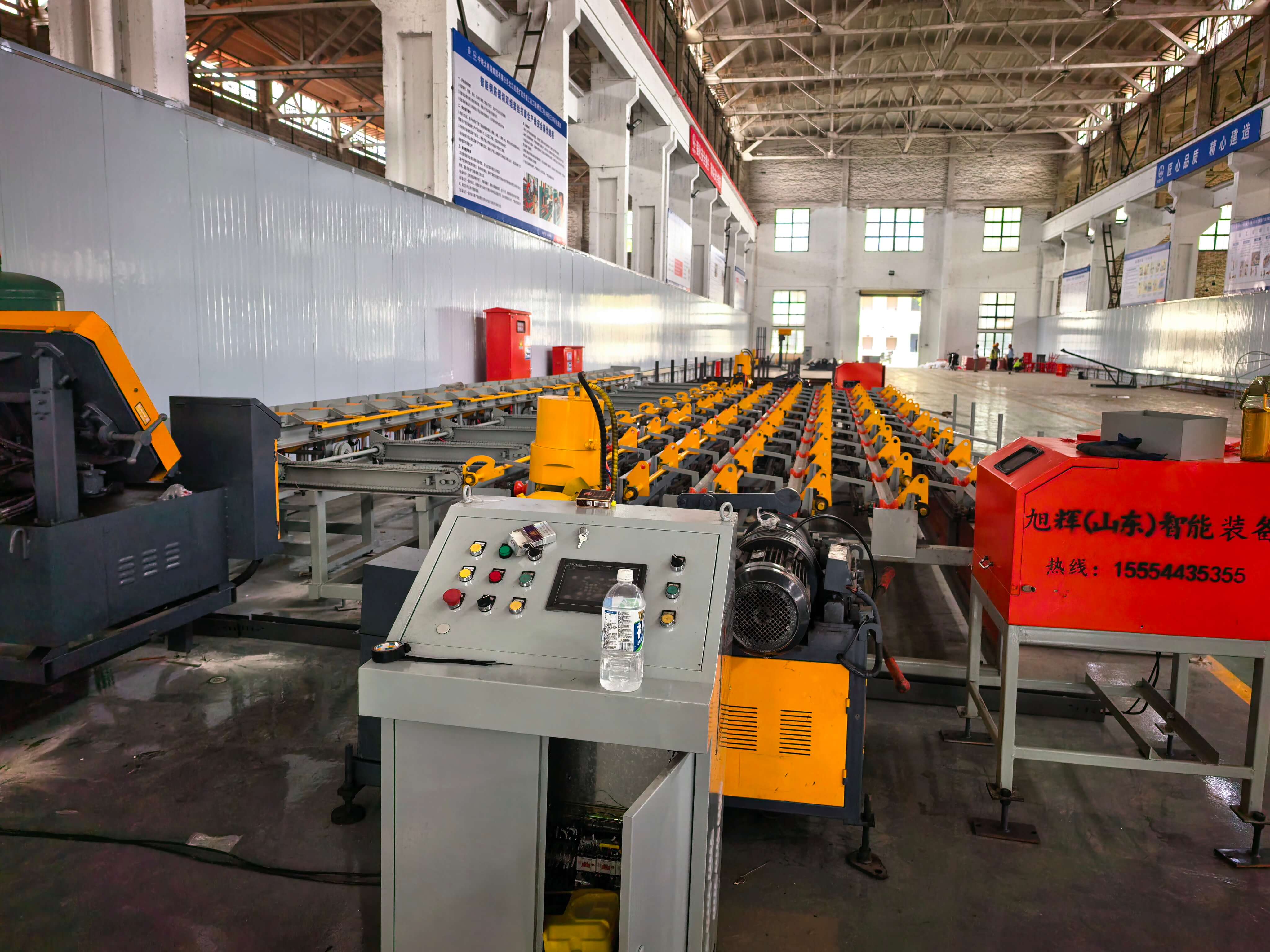 CNC steel bar cutting threading line in operation
