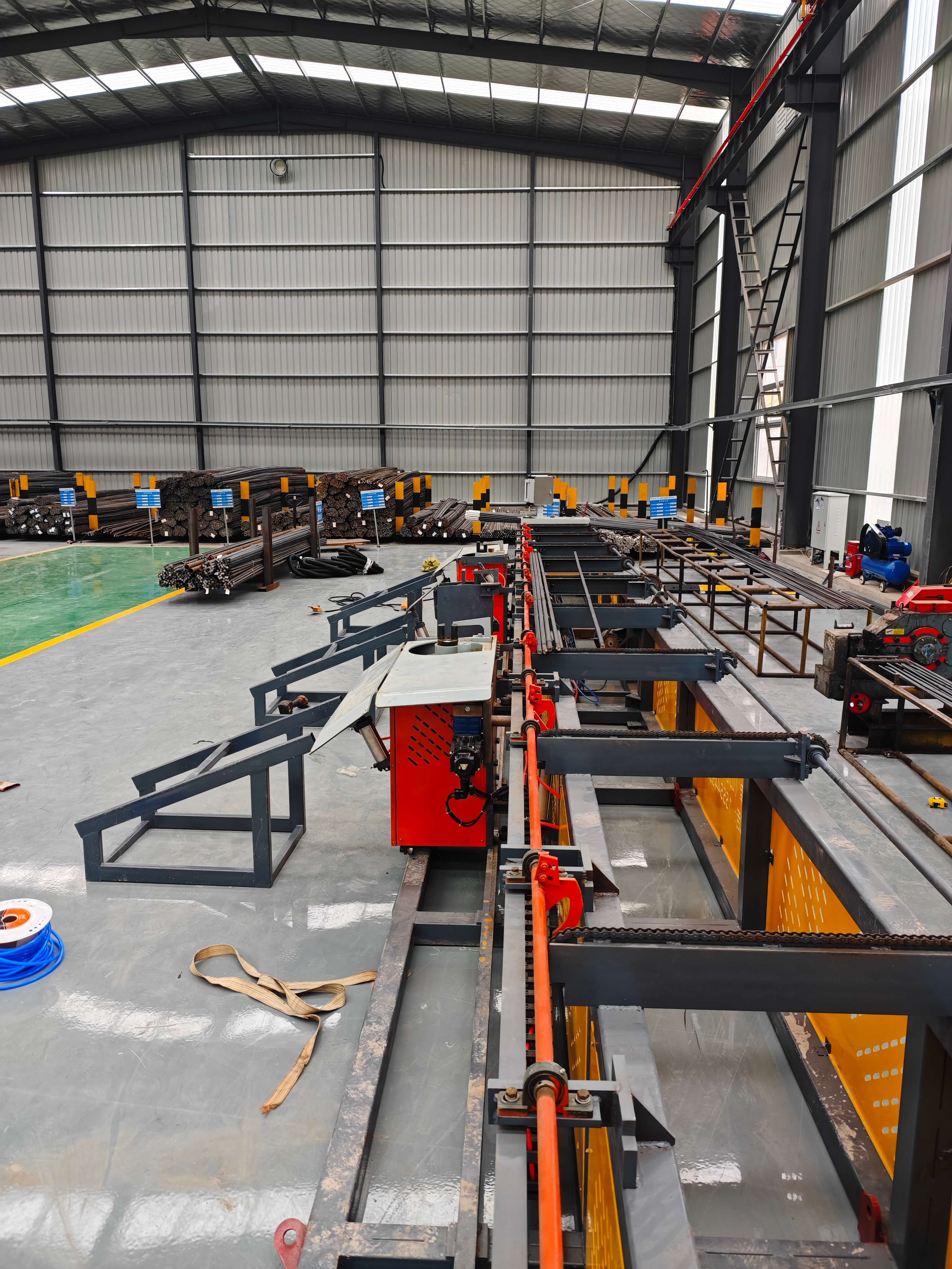 Four-head horizontal CNC rebar bending center in operation