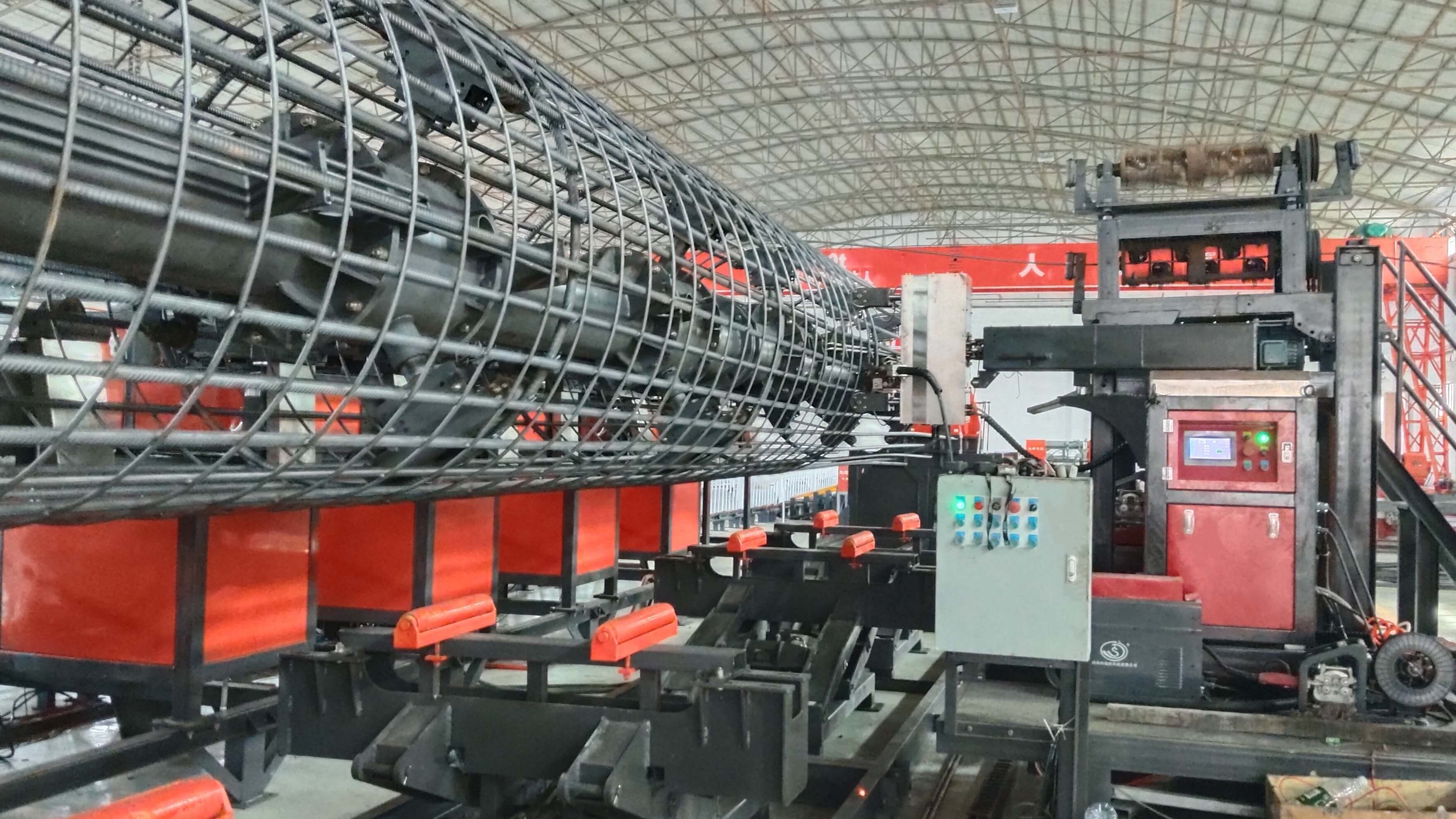CNC steel cage welding workstation in operation