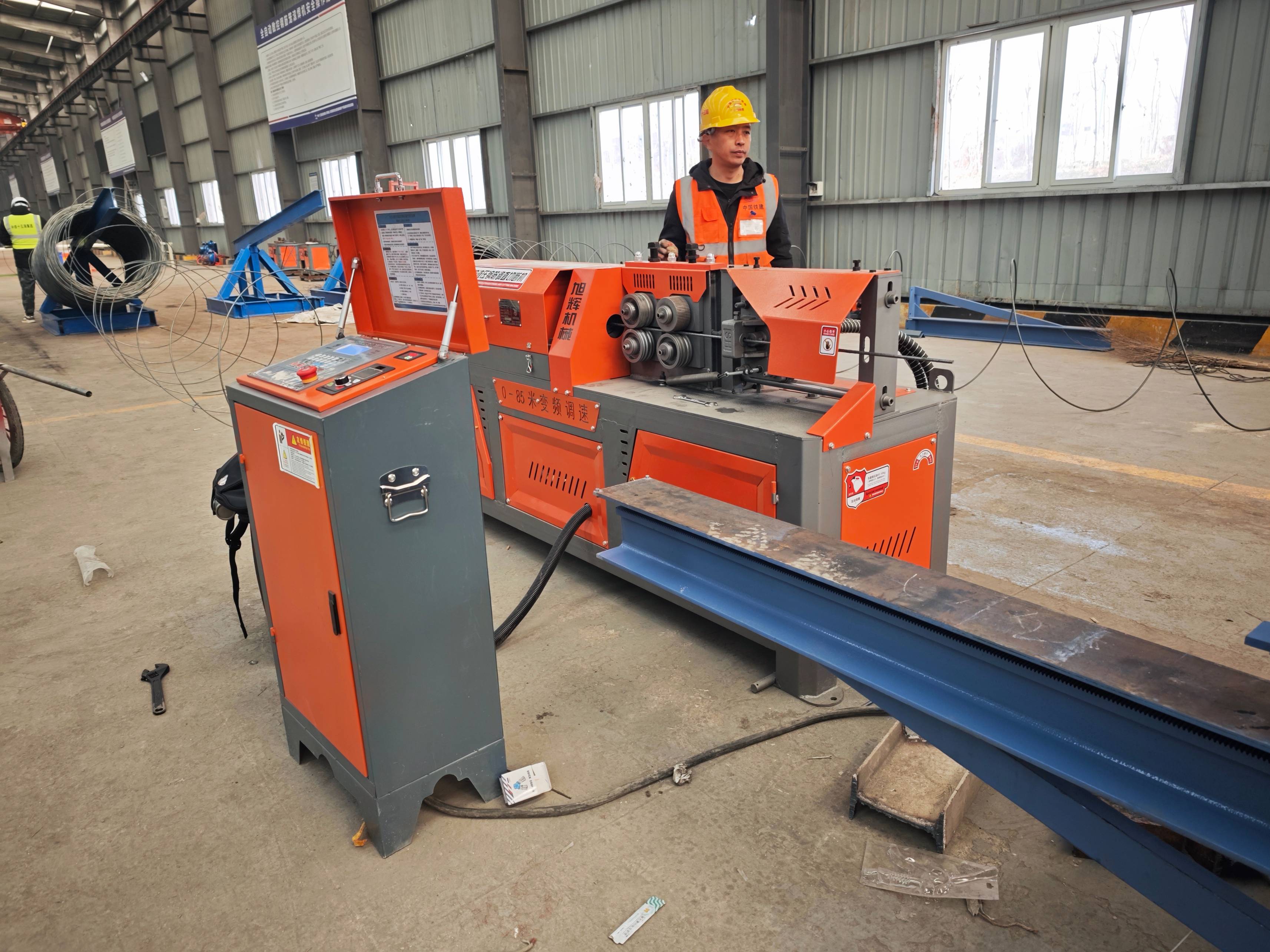 CNC steel bar straightening and cutting machine in operation