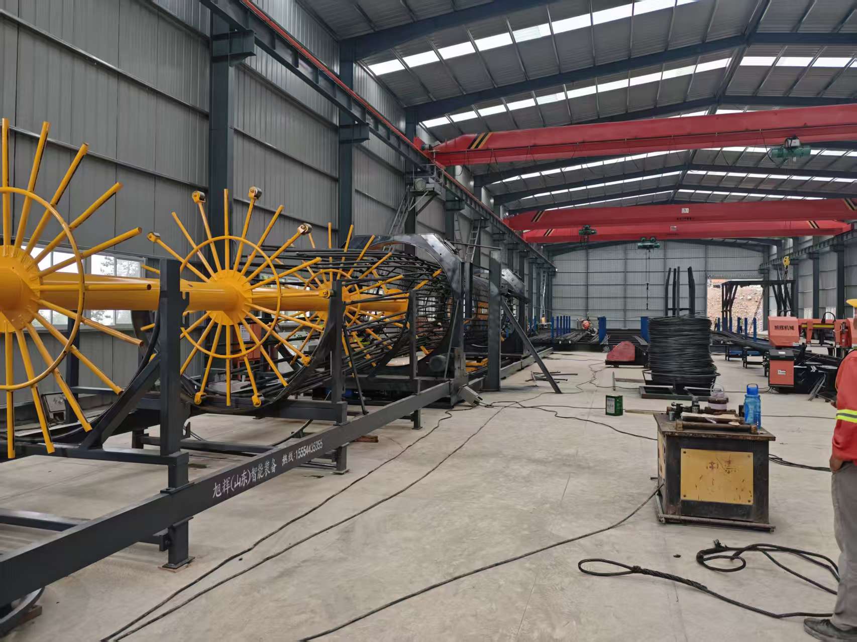 Automated steel reinforcement cage forming process