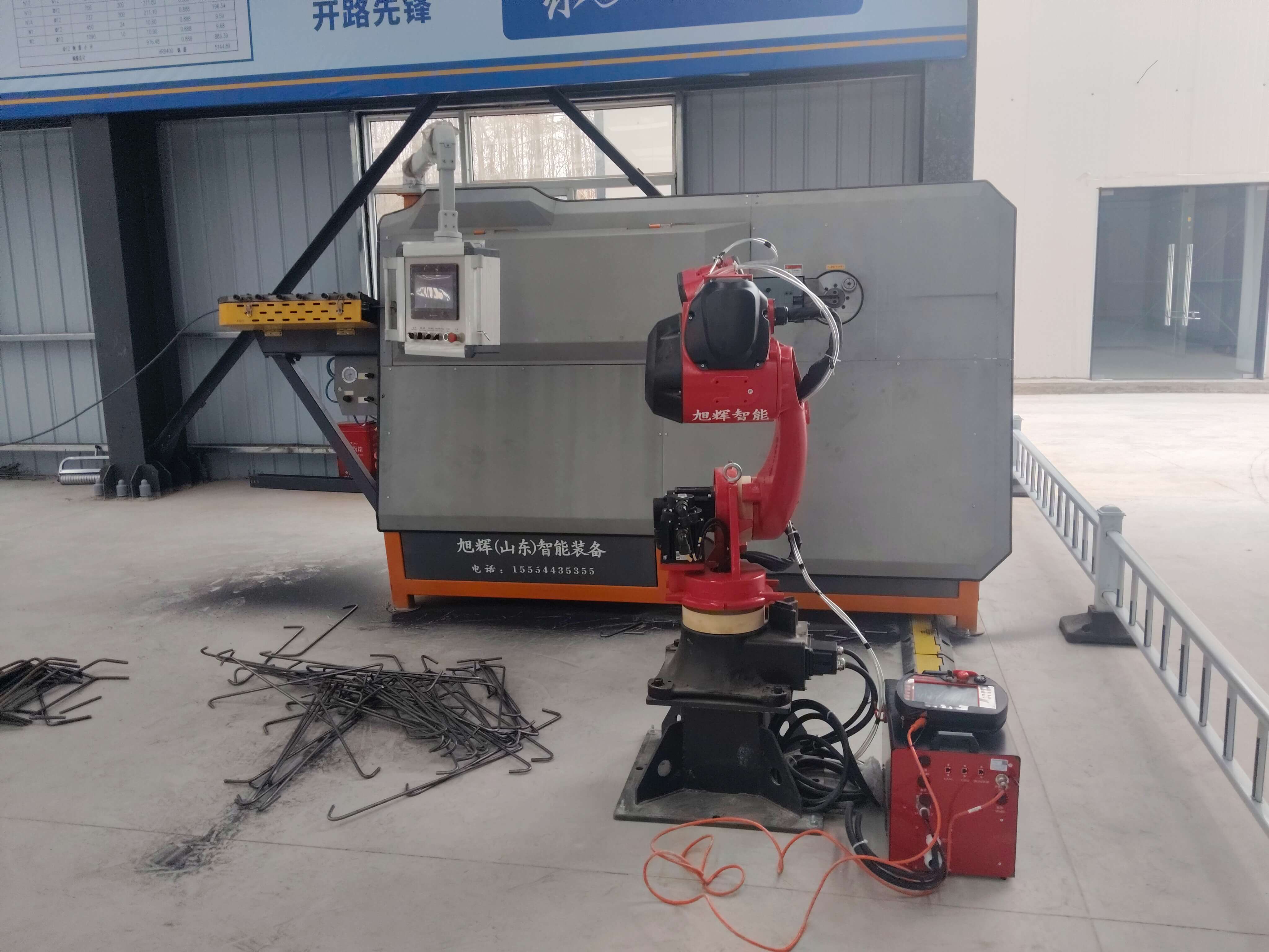 Fully automatic CNC steel bar stirrup bender in operation