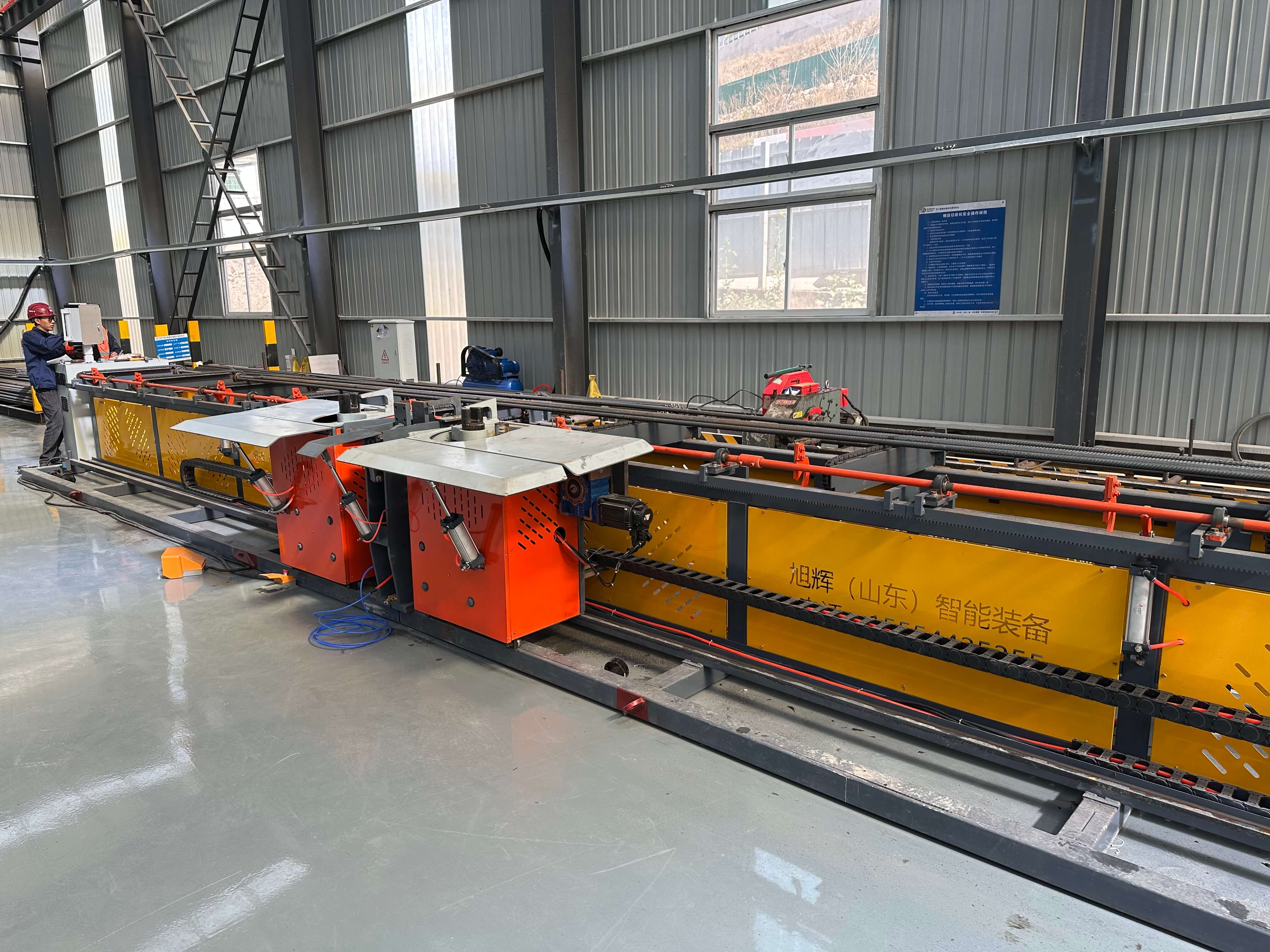 Four-head horizontal CNC rebar bending center for railway projects