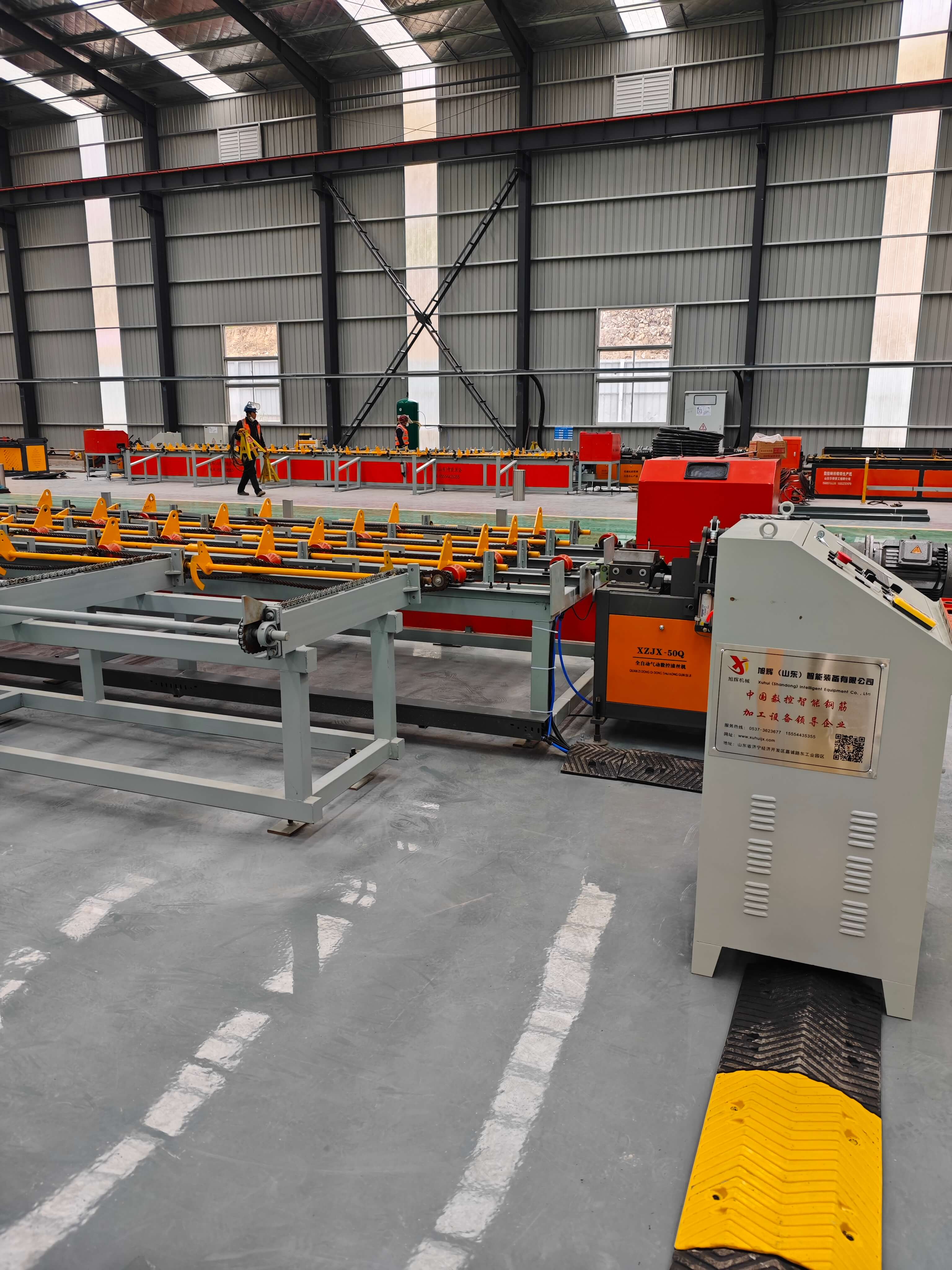Fully automatic steel bar sawing threading production line