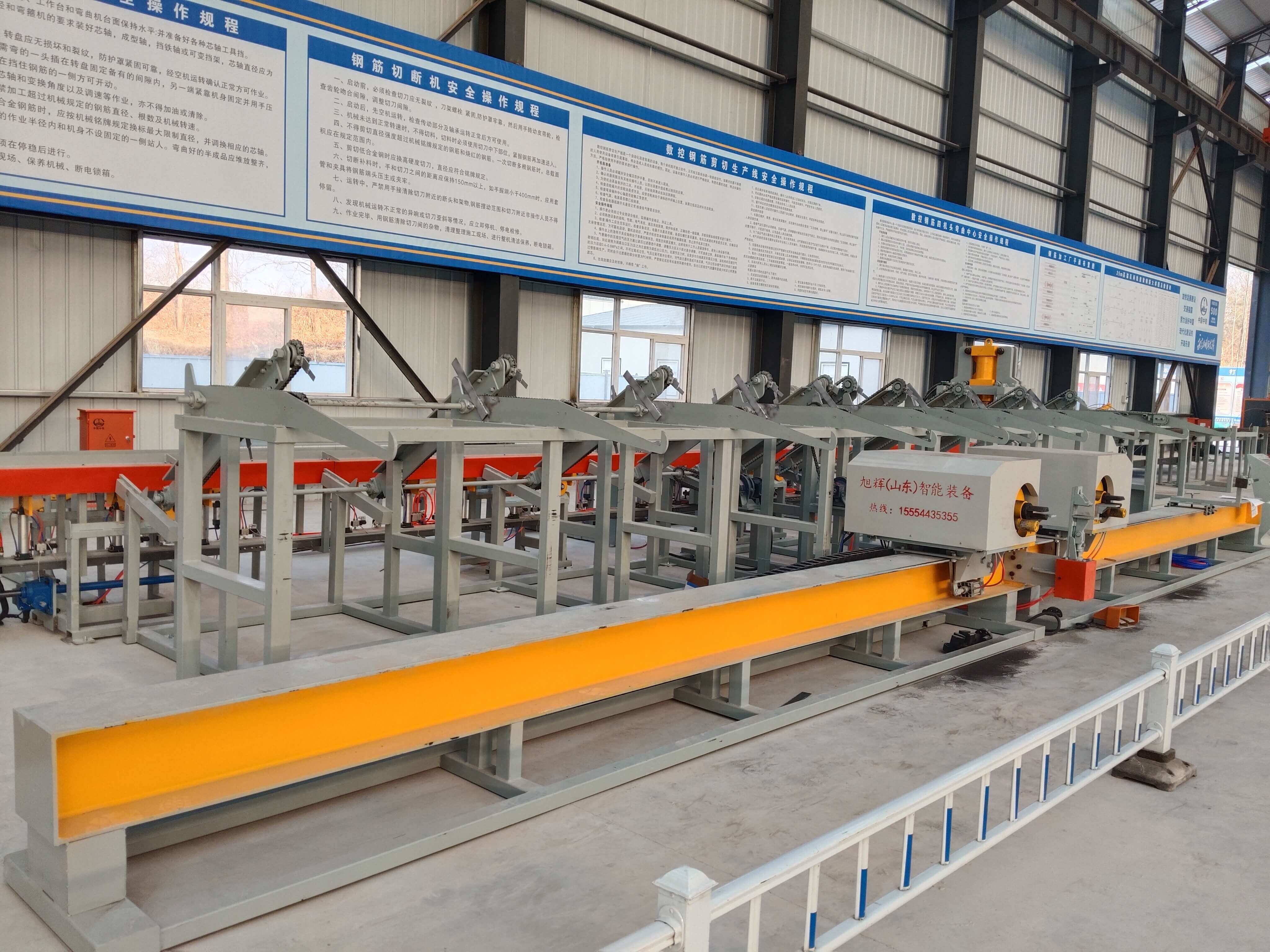 Two-head steel bar bending center in operation