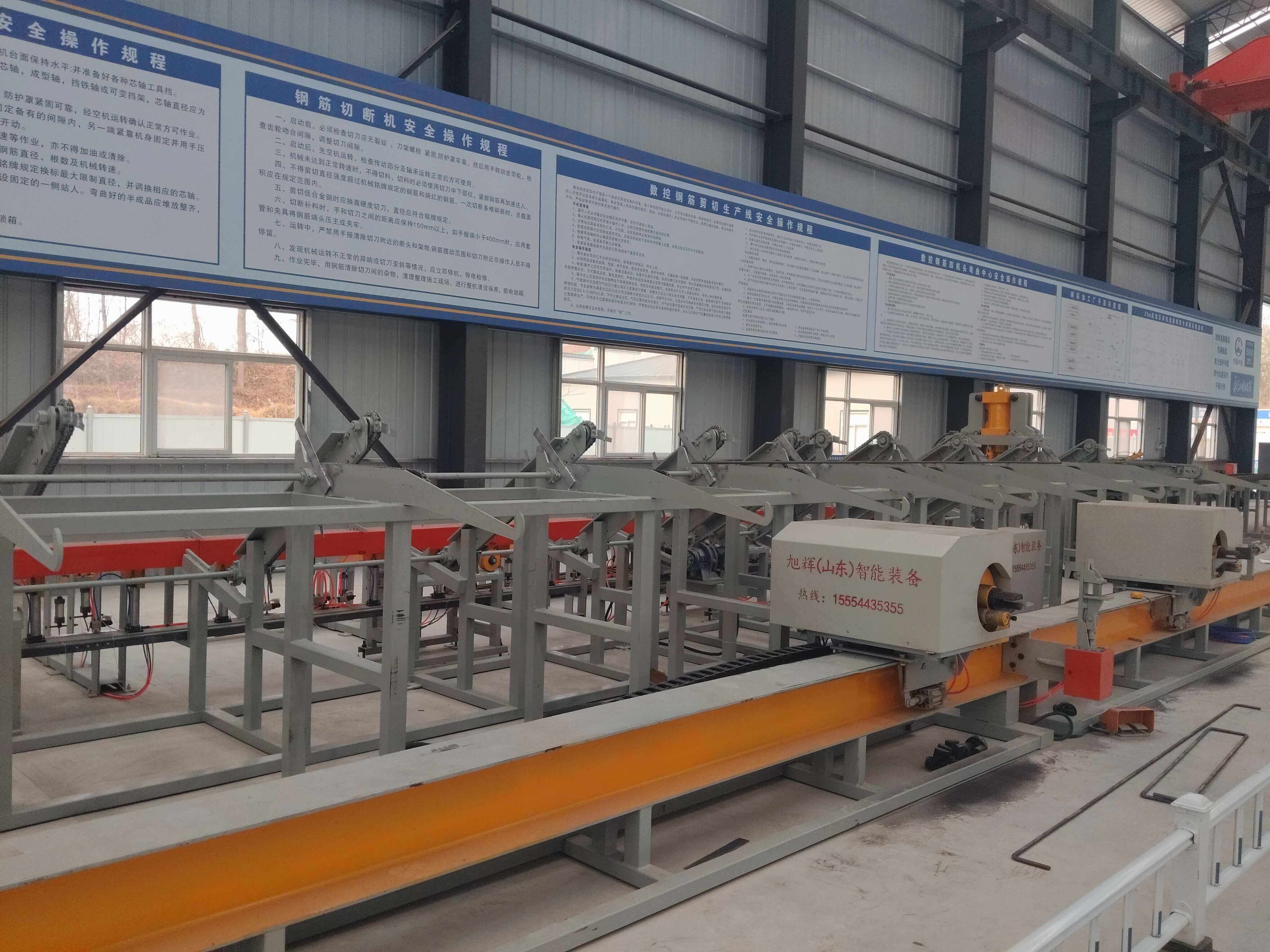 Four-head rebar bending center in operation