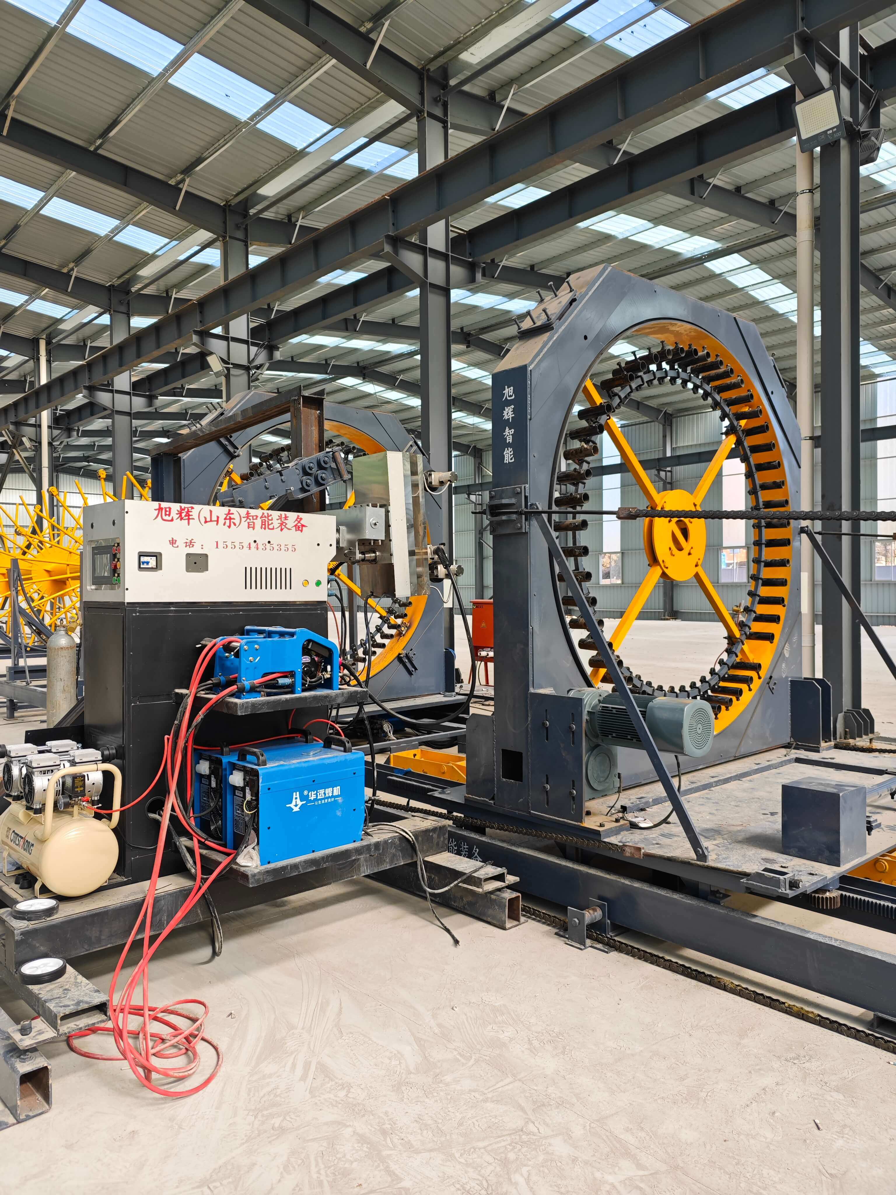 Steel reinforcement cage rolling welder in operation