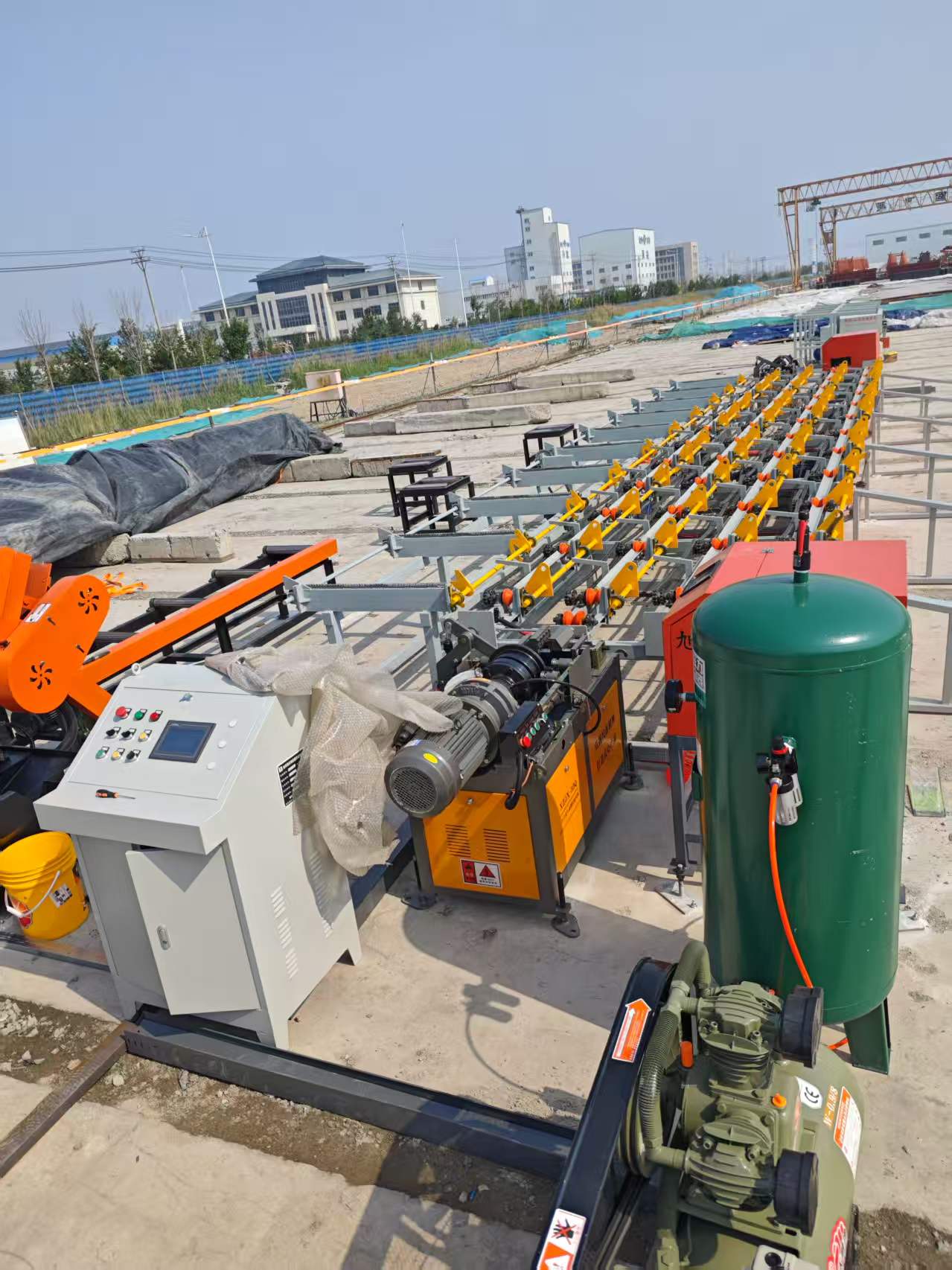 Fully automatic steel bar sawing threading and grinding production line