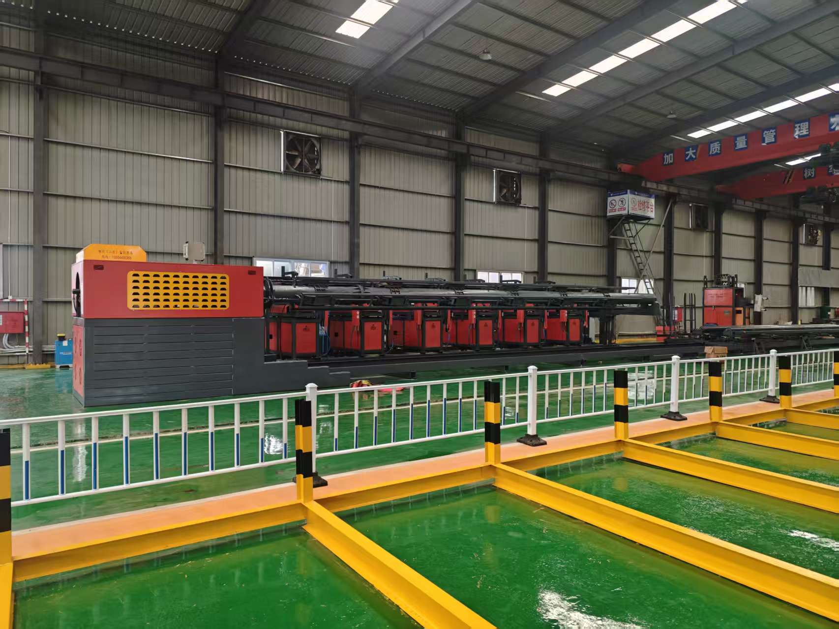 Reinforcing cage workstation manufacturing process