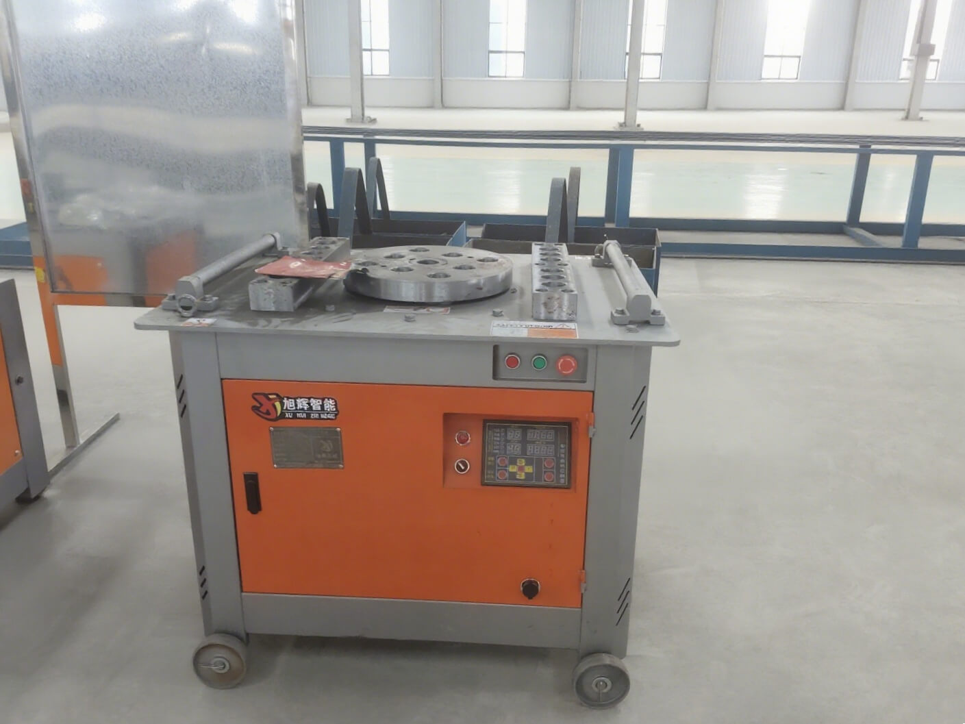 Fully automatic CNC steel bar bending machine in operation