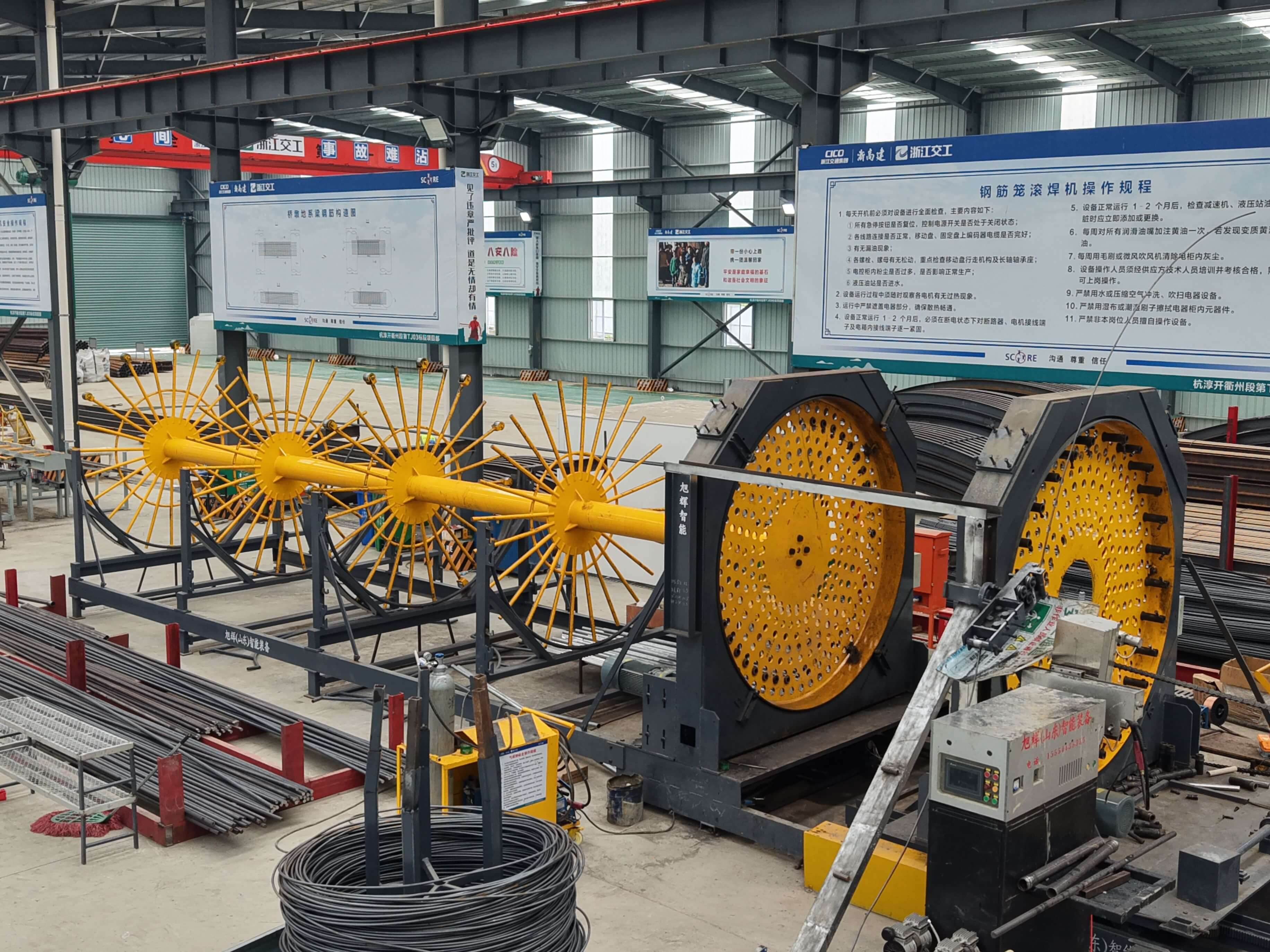 Automatic steel reinforcement cage rolling machine in operation