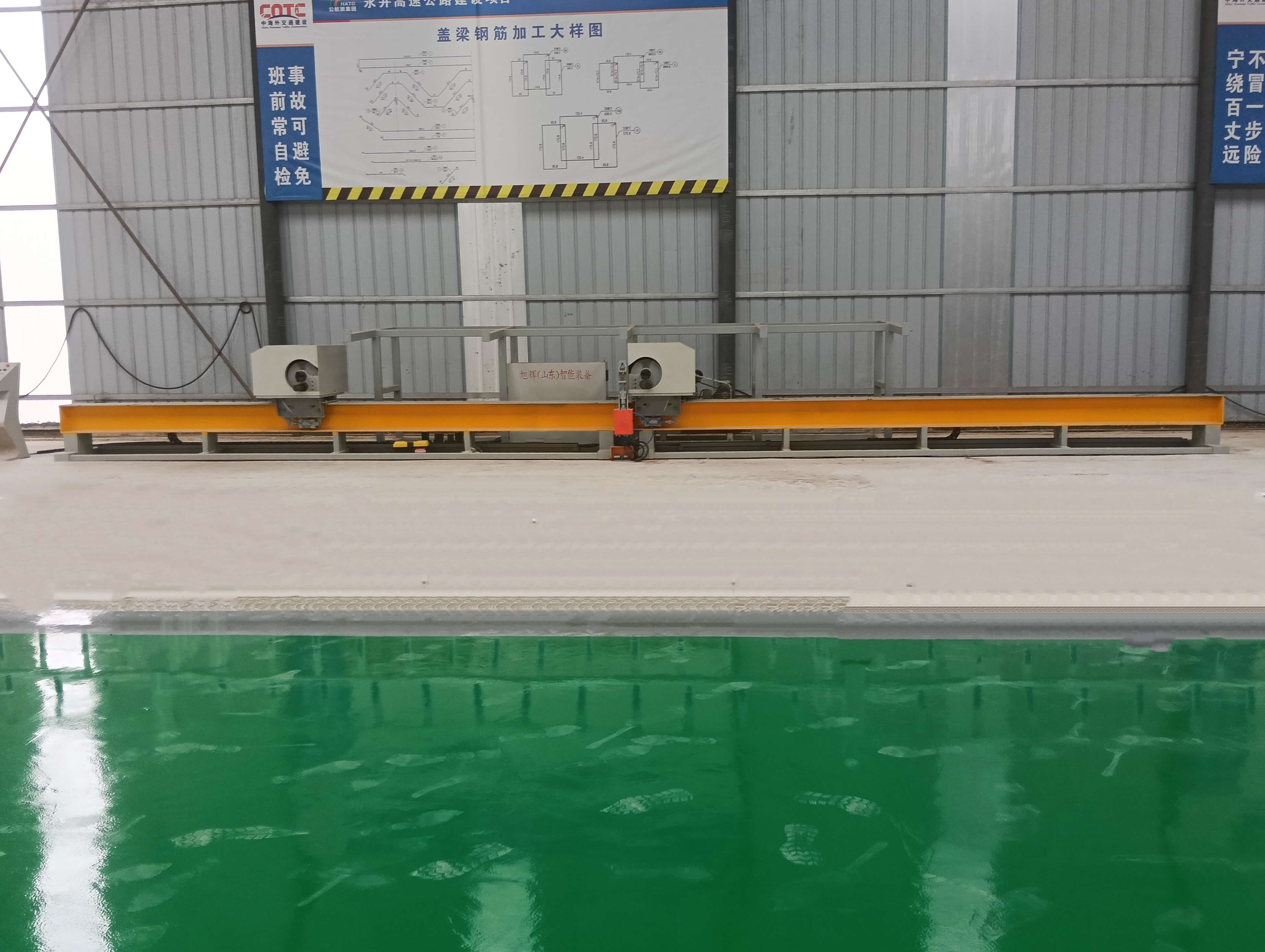 Two-head steel bar bending center in operation