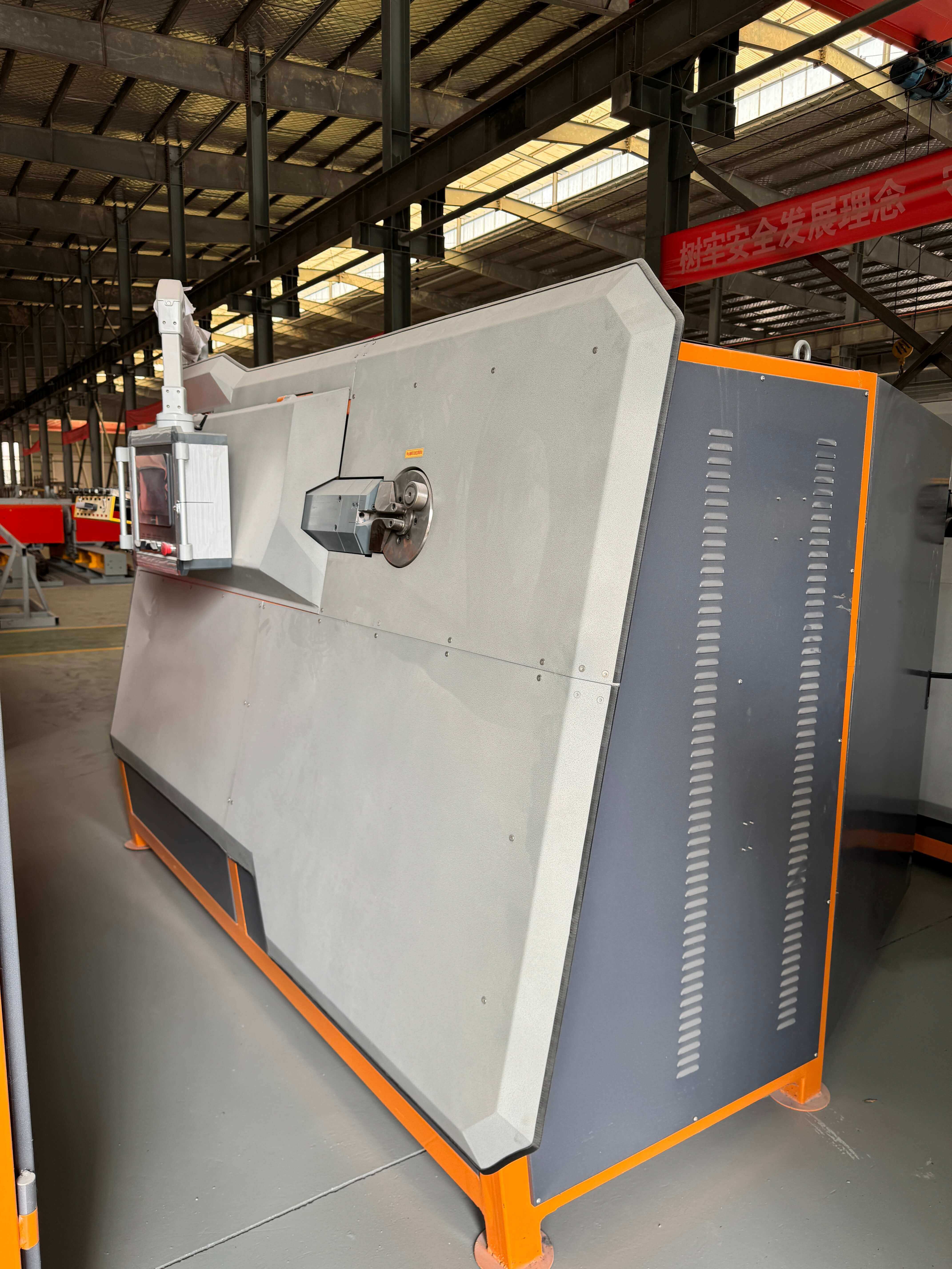 CNC steel bar bending center in operation