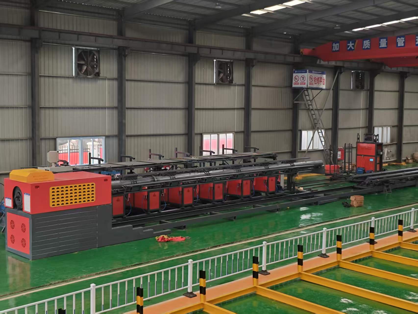 Steel cage welding workstation in operation
