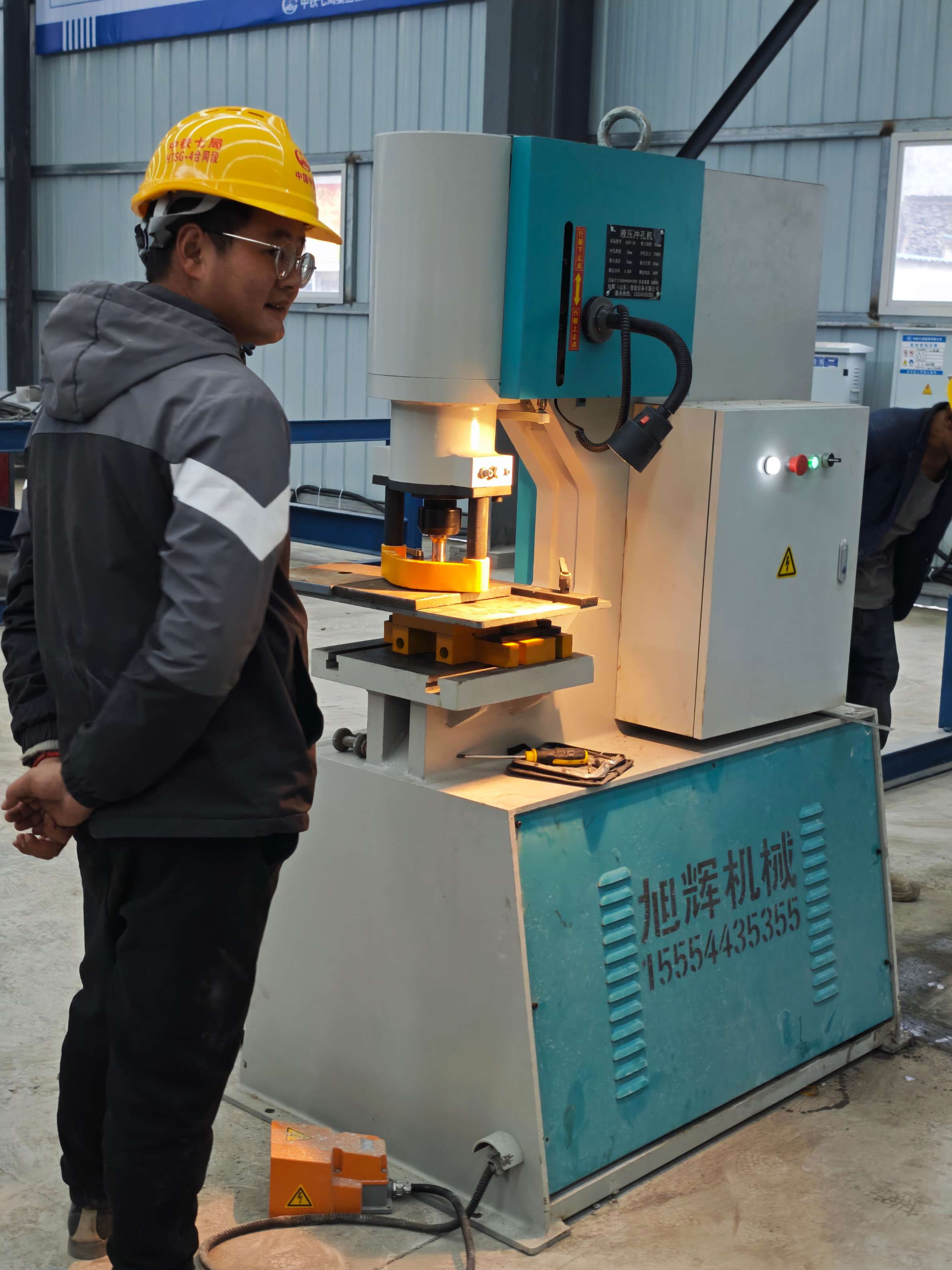 Steel cage forming equipment in operation