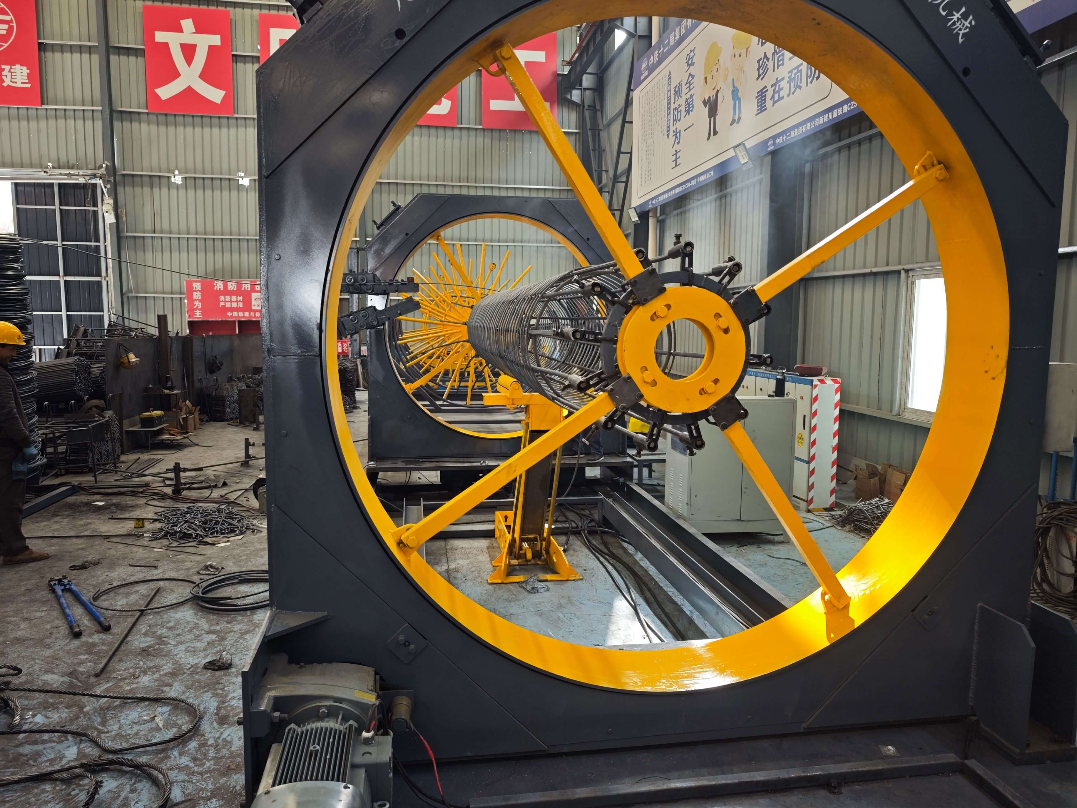 Fully automatic steel reinforcement cage welding machine in operation