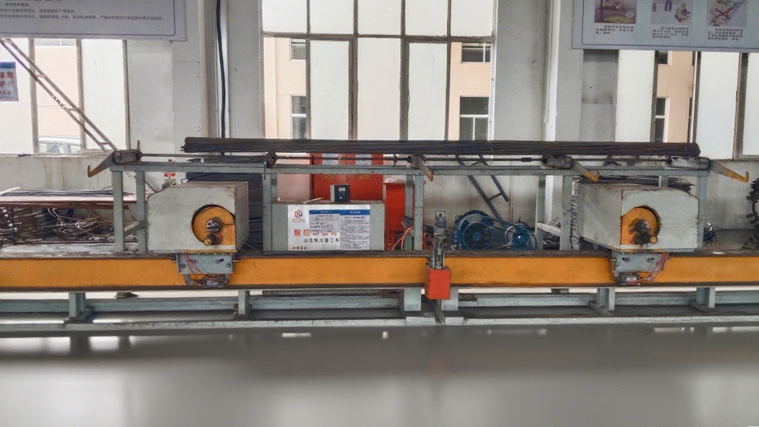 Two-head steel bar bending center in operation