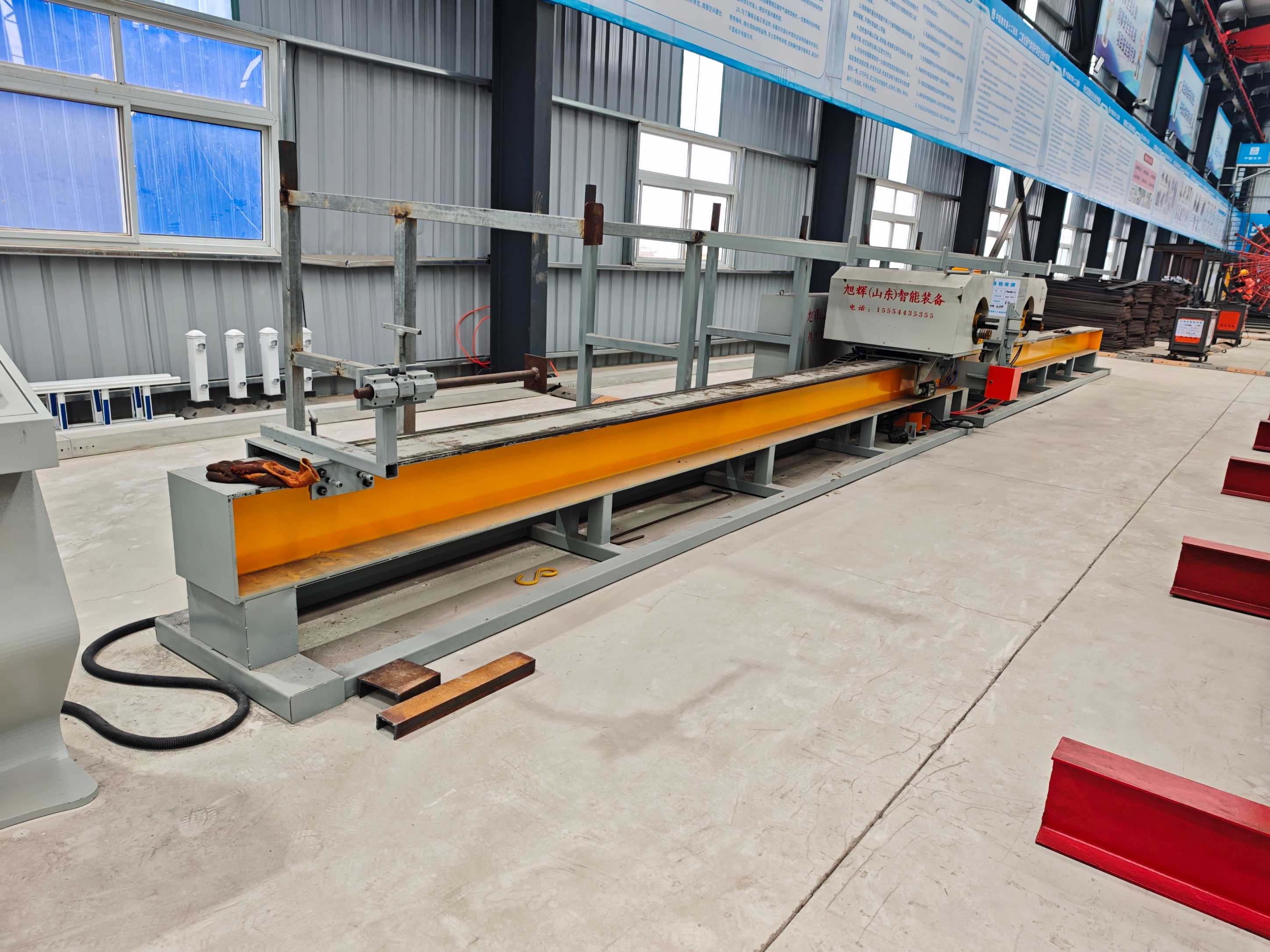Four-head steel bar bending center in operation