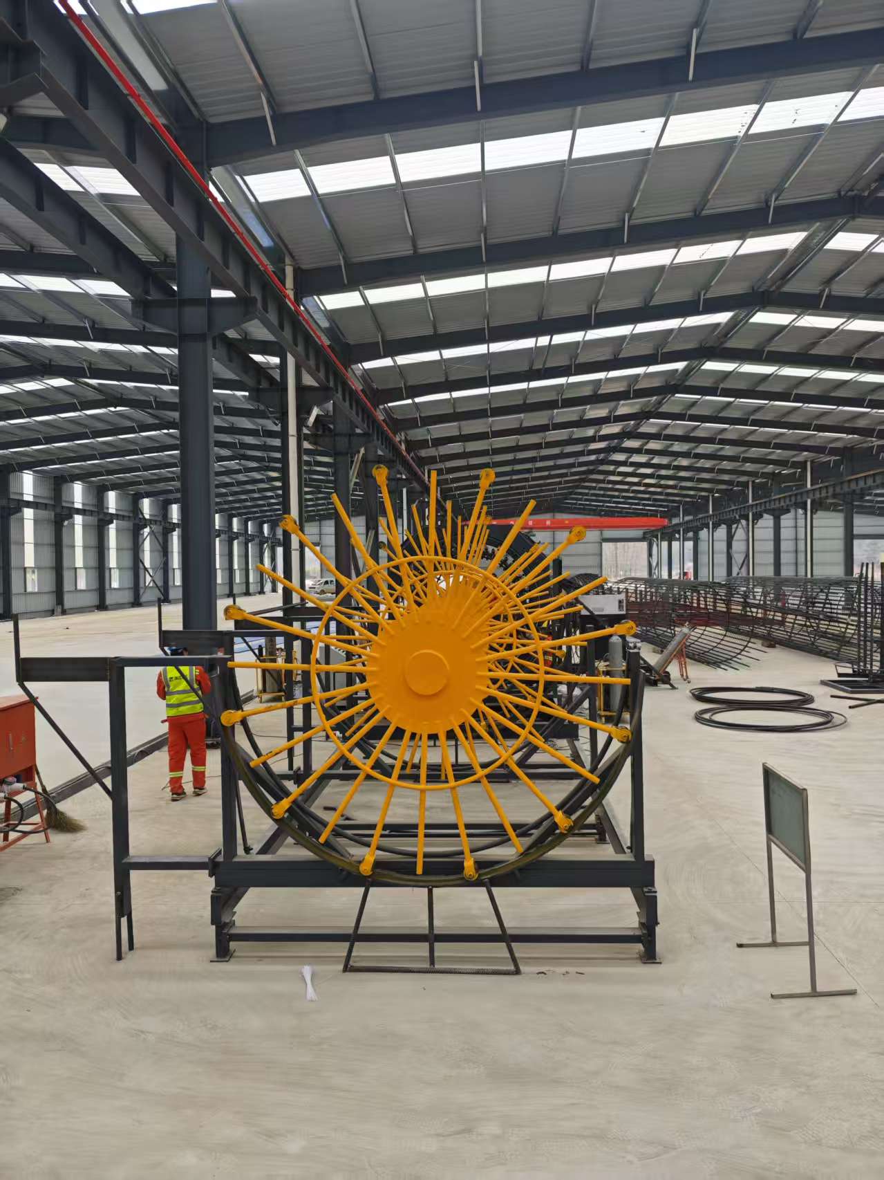 Fully automatic steel bar cage rolling welder in operation