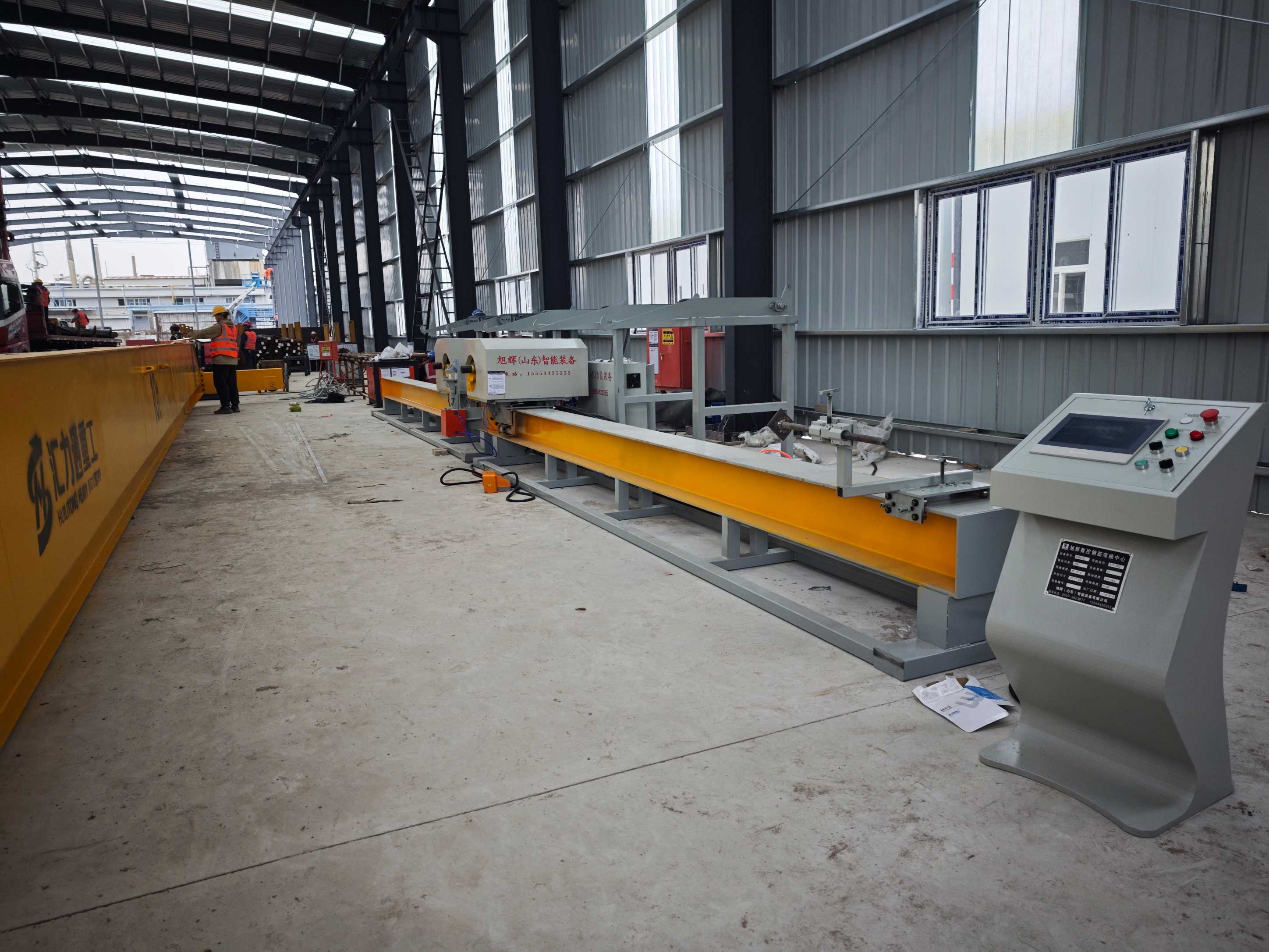 CNC steel bar bending center in operation