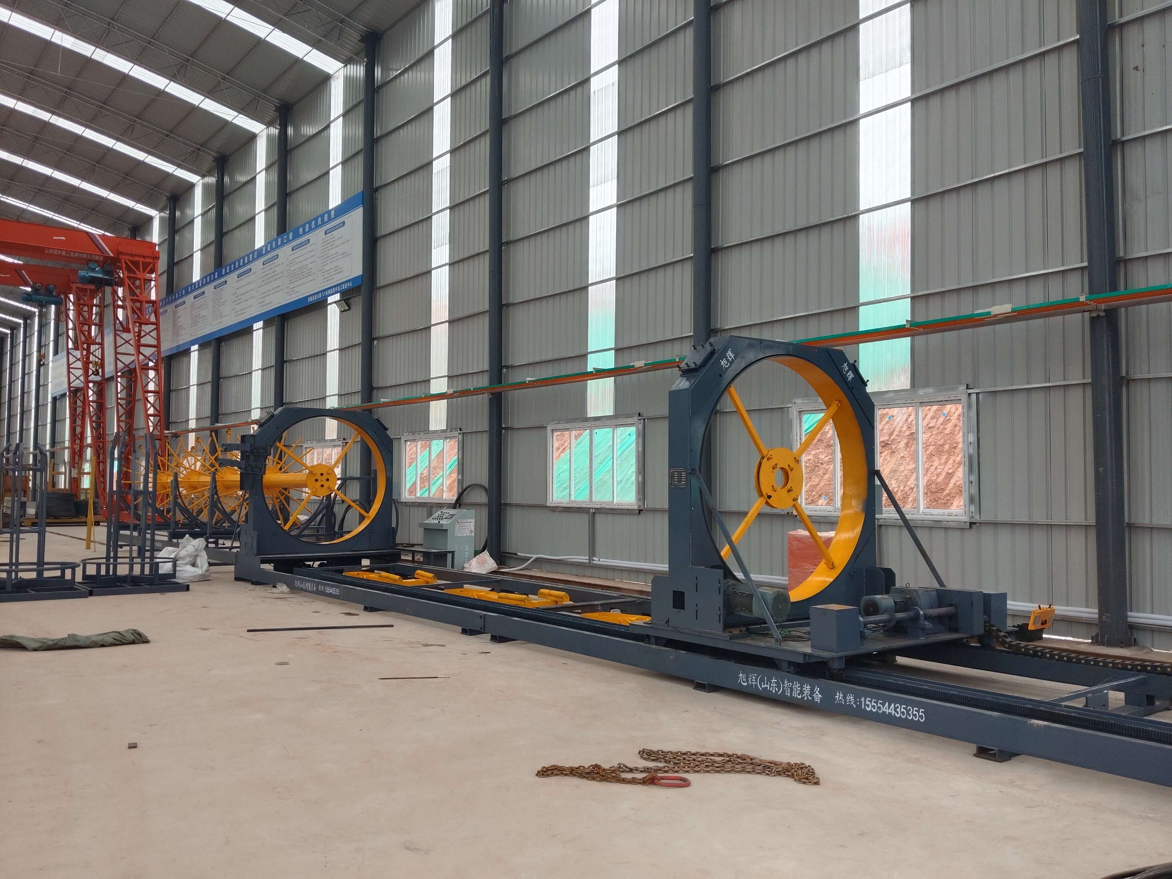 Fully automatic steel bar cage rolling welder in operation