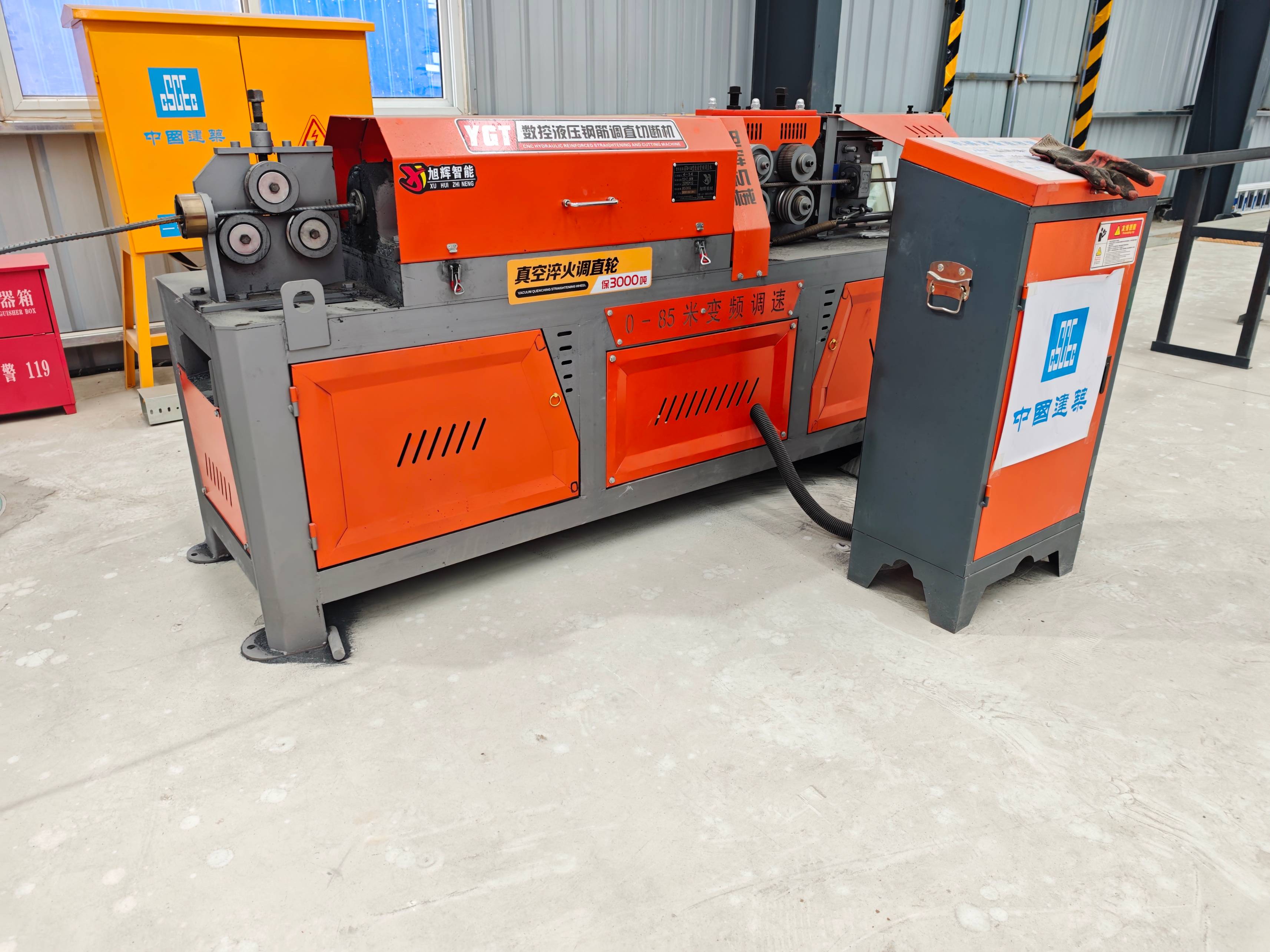 CNC steel bar straightening and cutting machine in operation