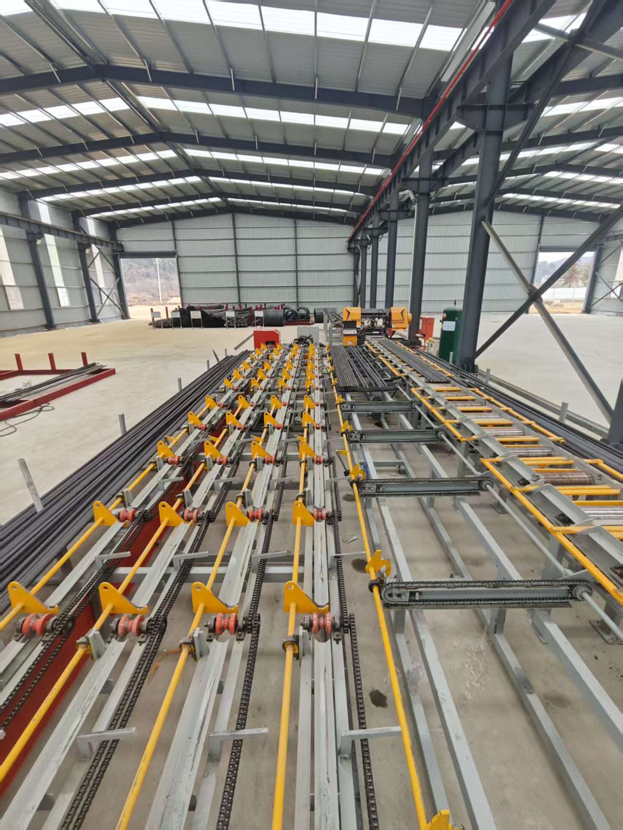 Industrial steel bar processing equipment operation