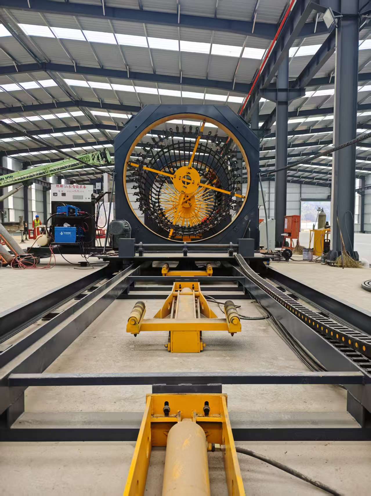 Fully automatic steel cage rolling welder in operation