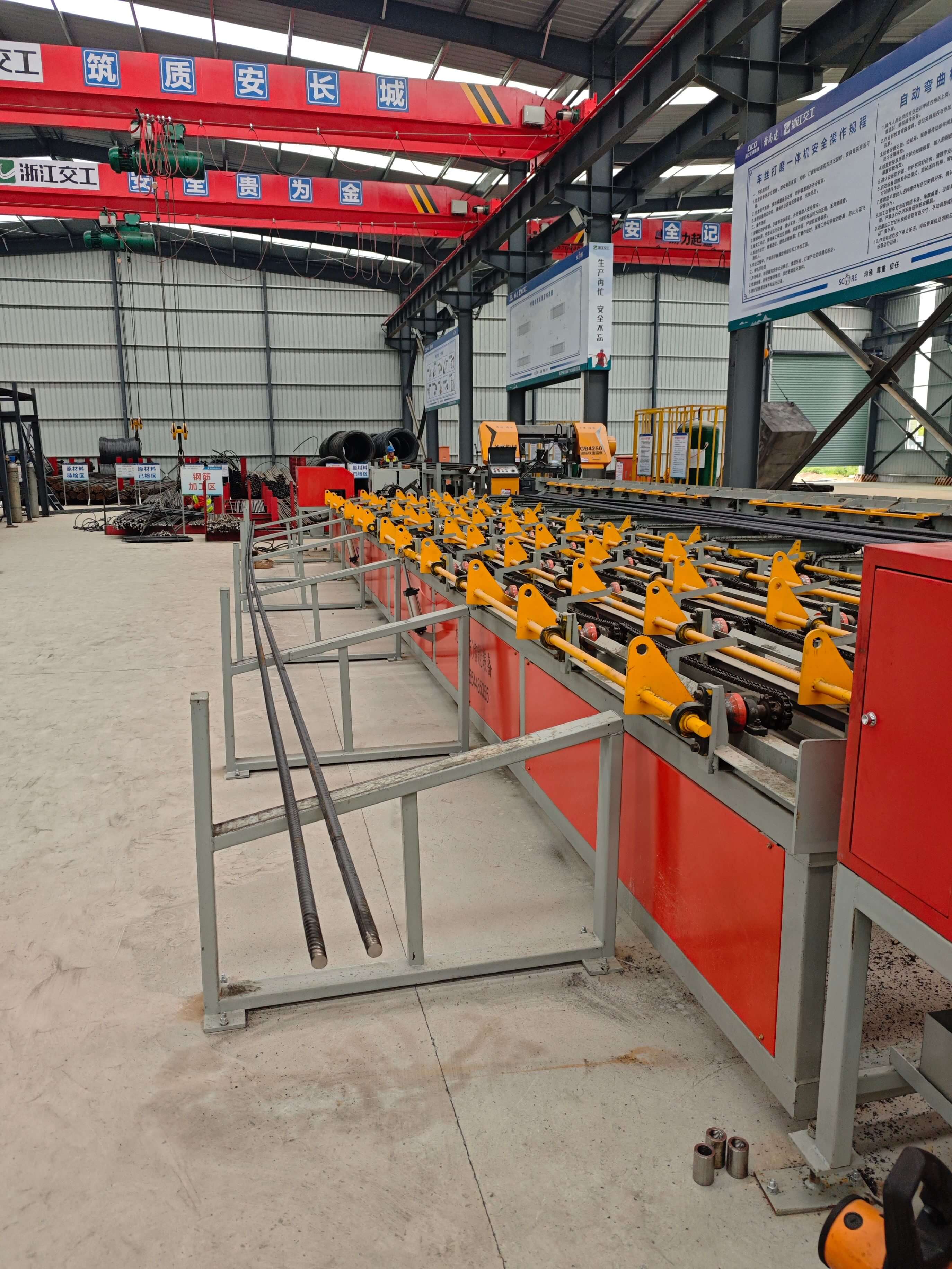 Fully automatic steel bar sawing threading and grinding production line