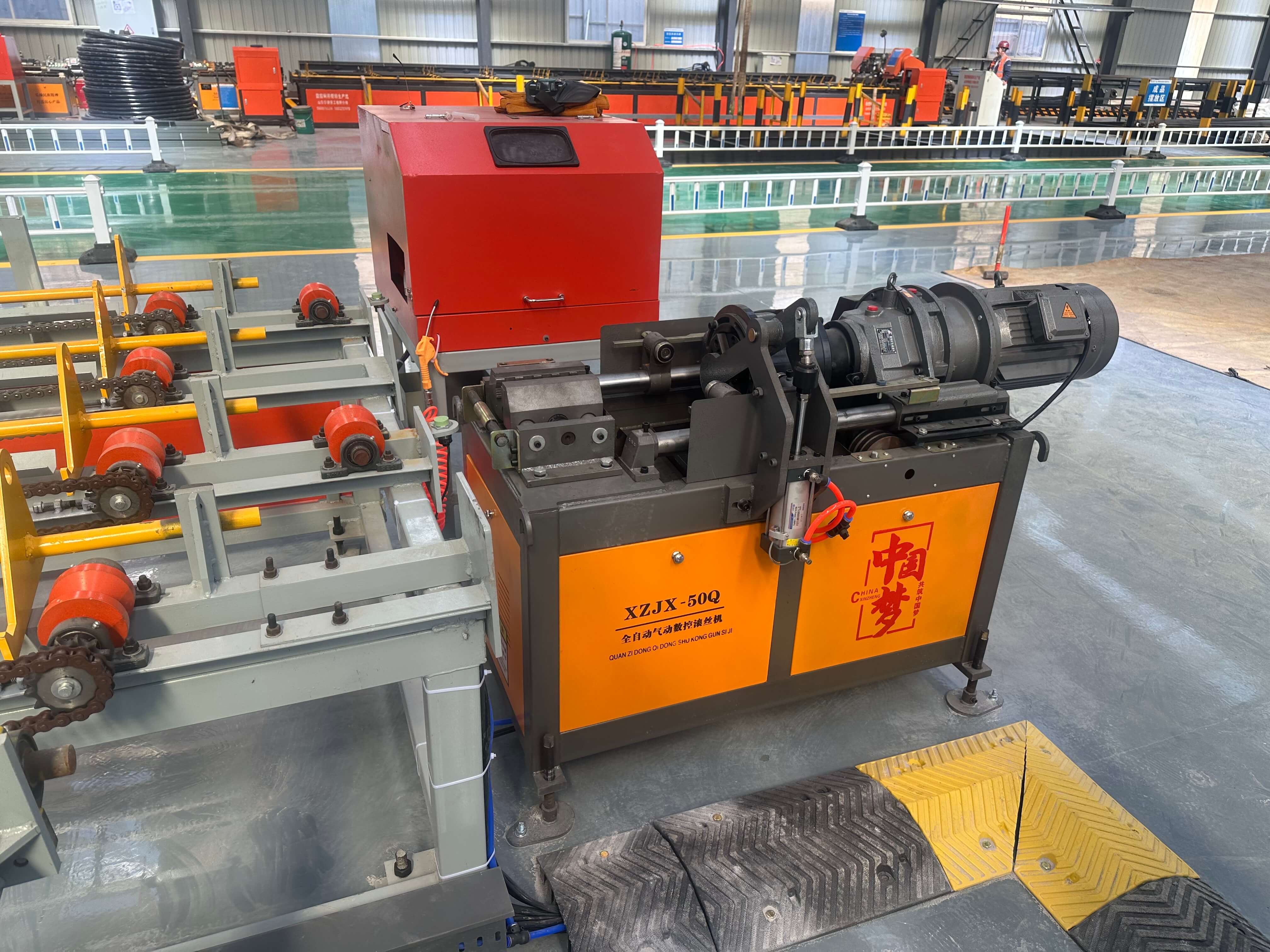 Technical team inspecting steel processing equipment