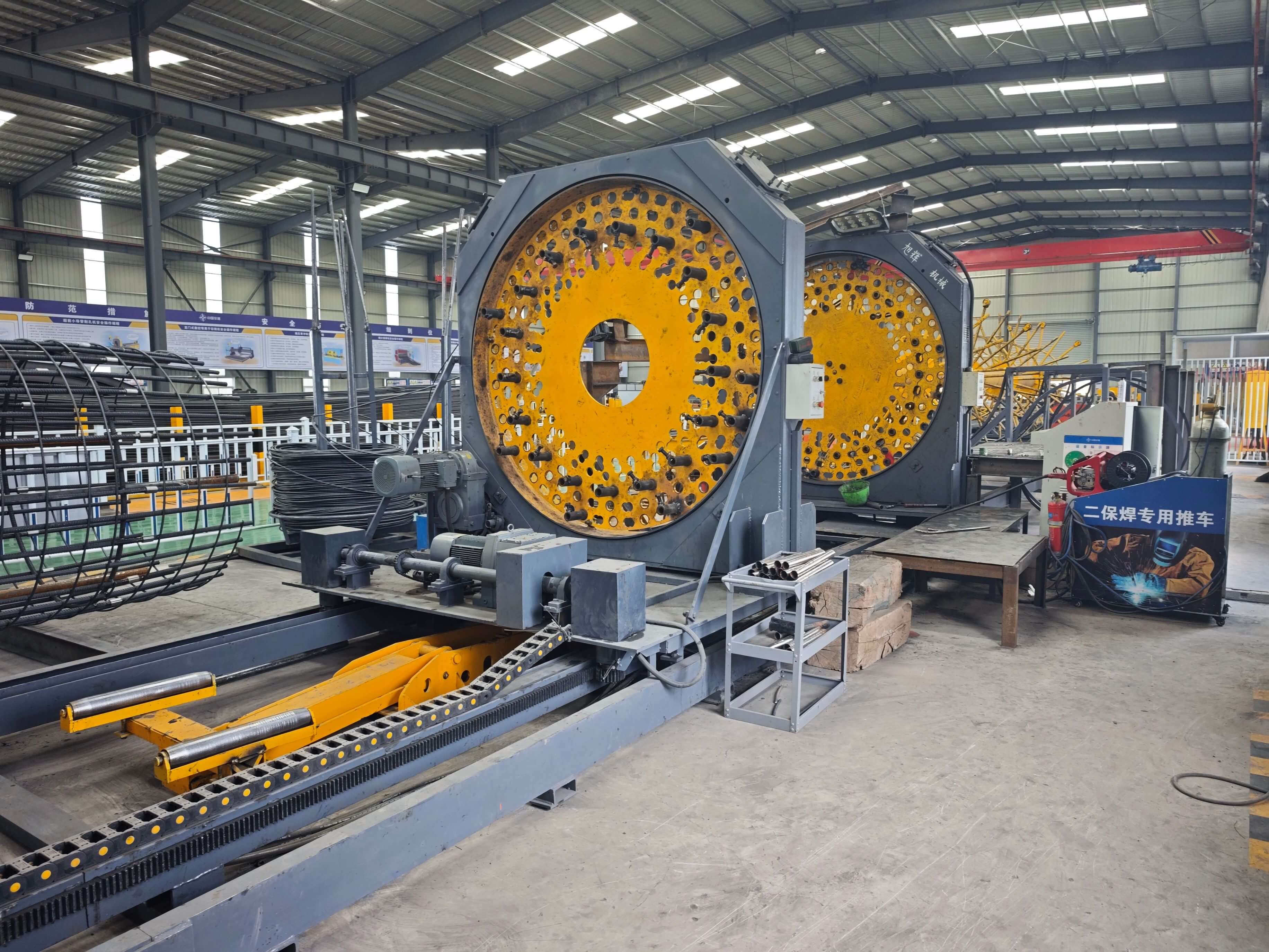 Pile foundation steel cage rolling welder in operation
