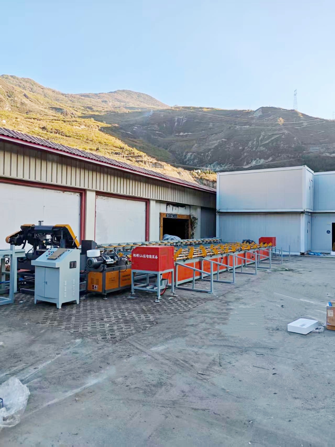 Fully automatic steel bar sawing threading and grinding production line