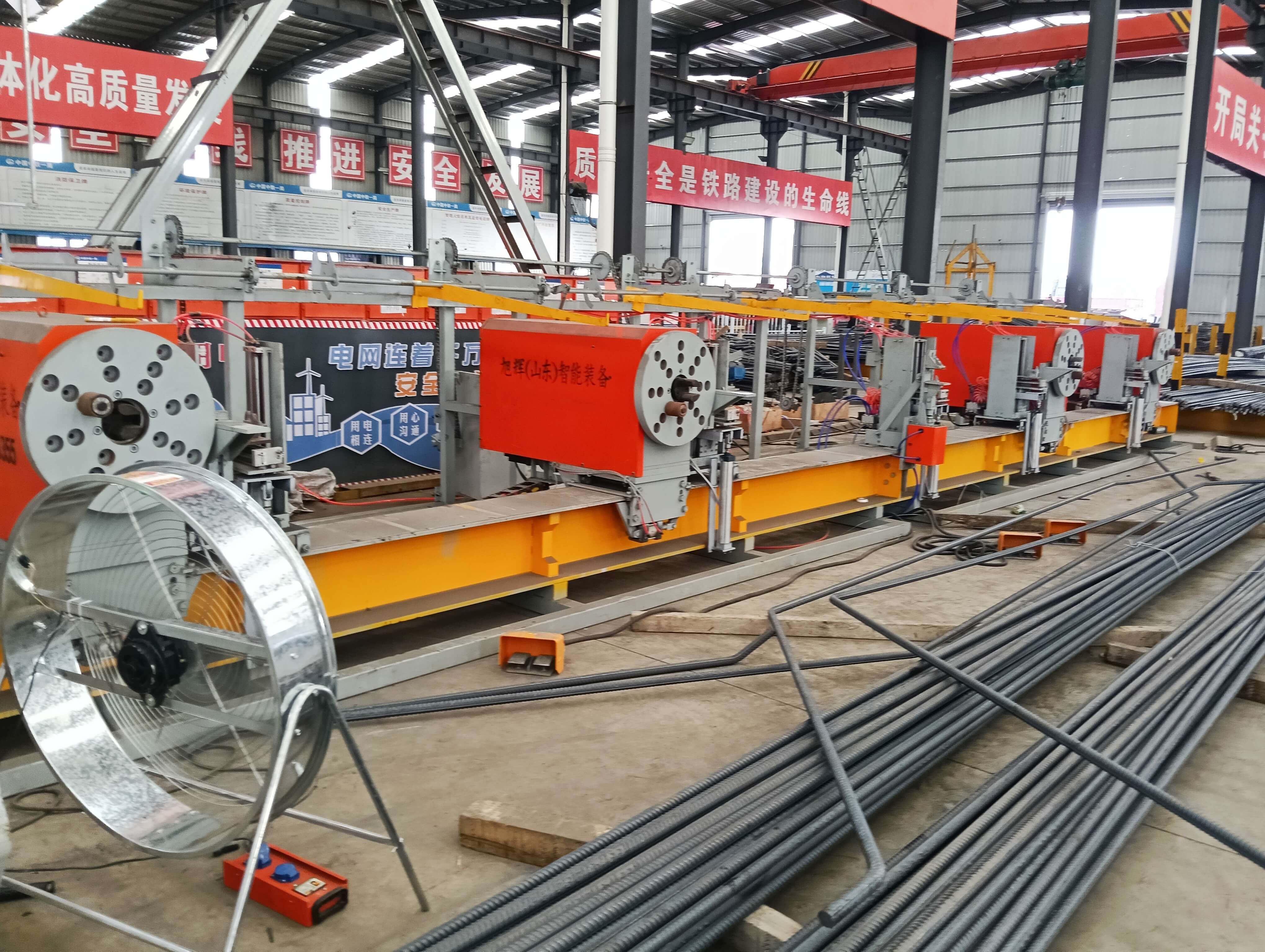 Numerical control four-head bending center in operation