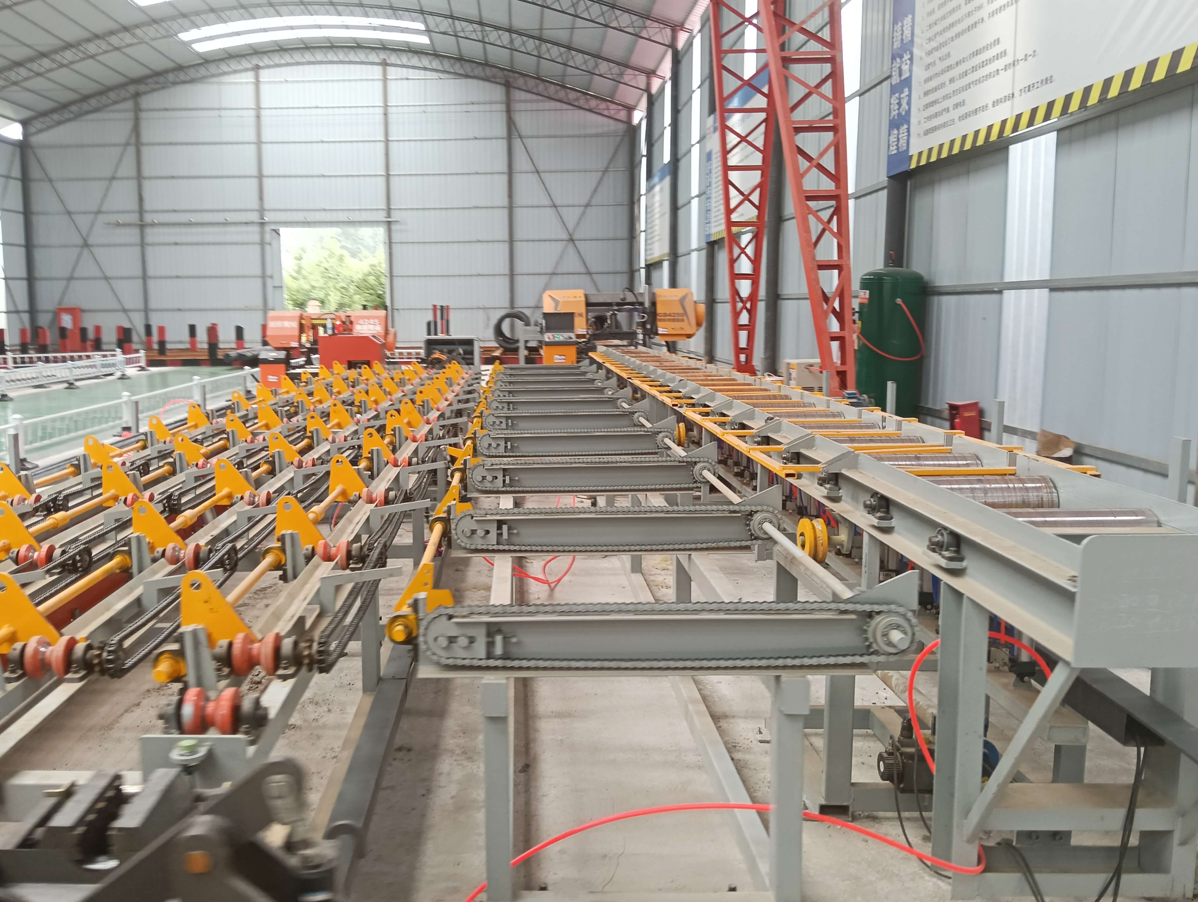 Industrial steel bar processing equipment in operation